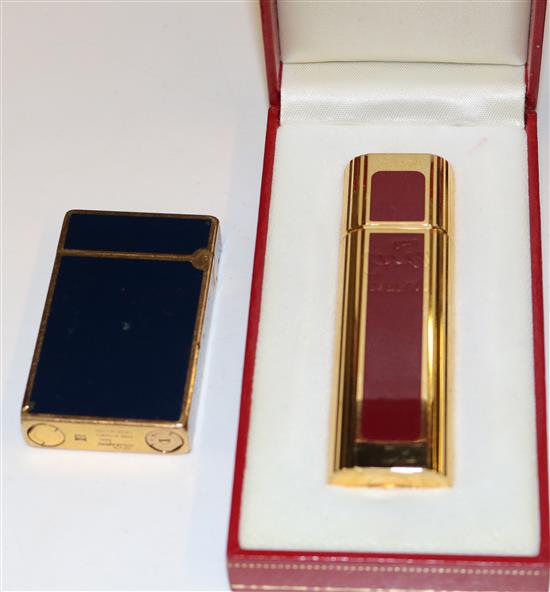 Dupont blue enamel and gilt metal pocket lighter and a Cartier perfume spray(-0